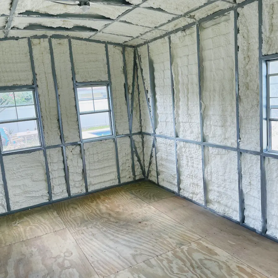 Closed-cell spray foam insulation applied to wall cavities in a residential project in Baldwinsville